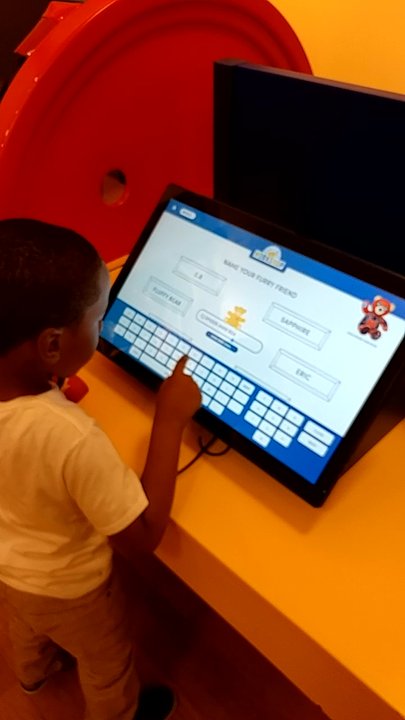 Build-A-Bear Workshop - Christian making the birth certificates for the bears - Toy Stores Near Me - Buford, Georgia