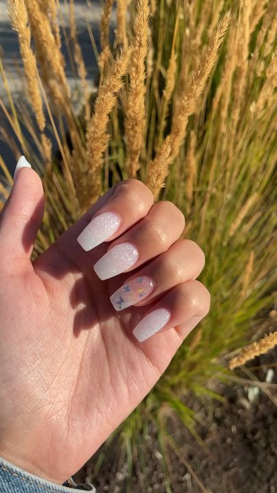 Ruby Nails & Spa - Dip nail set with butterflies on the accent nail! Gorgeous - Nail Salons Near Me - Camas, Washington