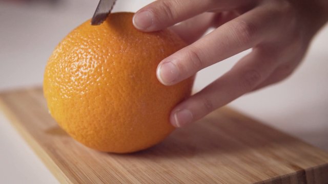 Cutting an orange