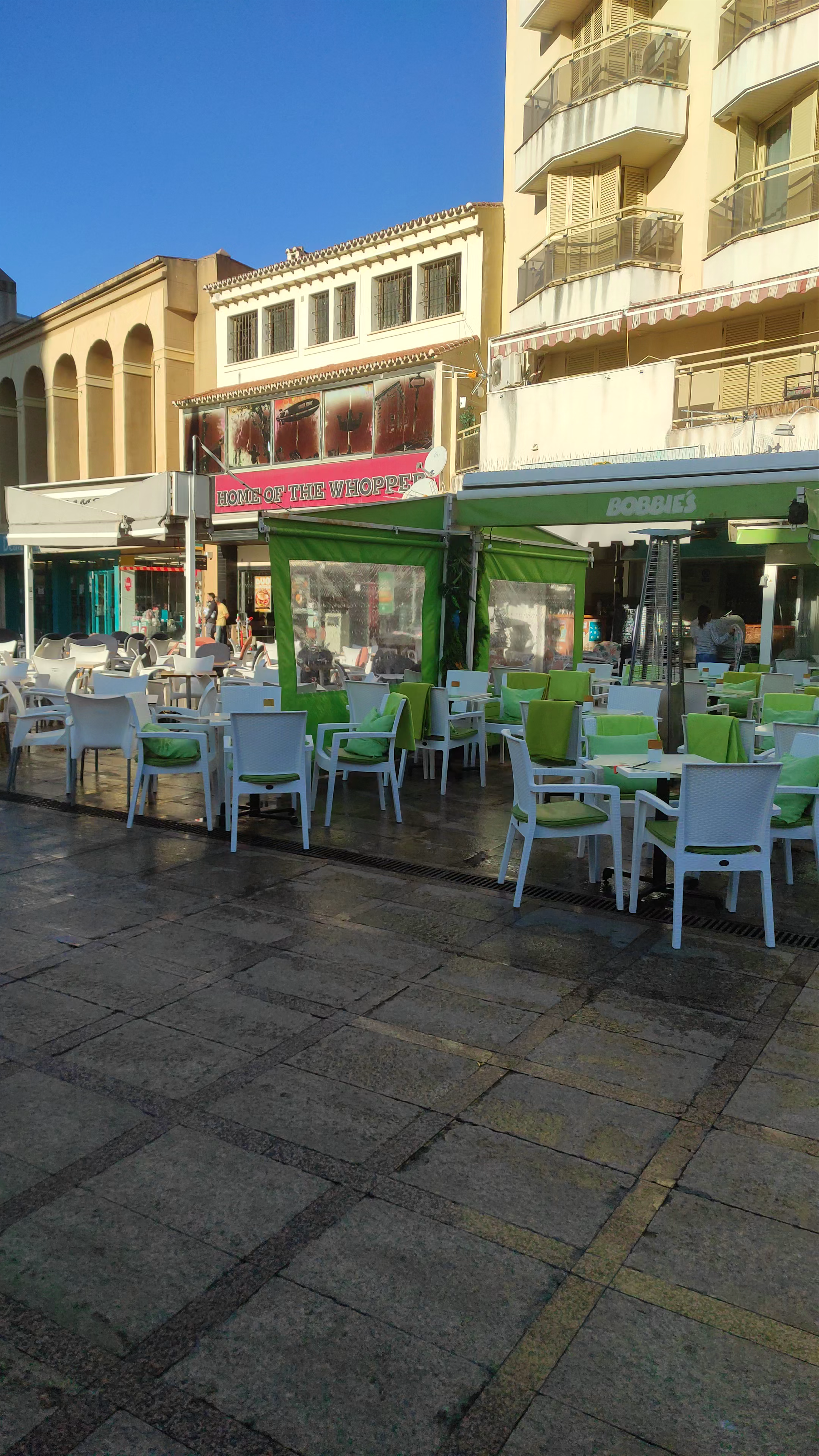 Sunny Morning at Torremolinos Plaza: Urban Charm in Andalusia