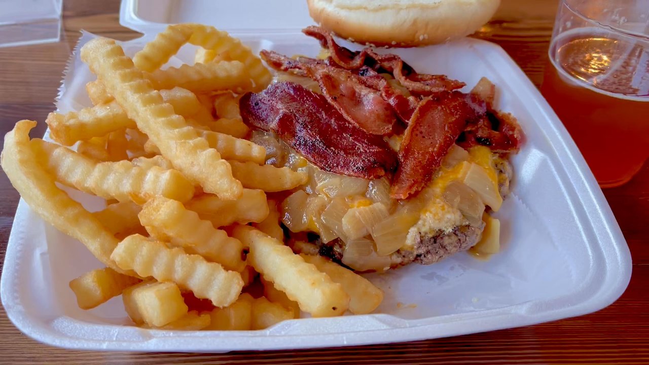 Barnstormers Burgers - The Cess-nator- 12oz beef burger, bacon, sautéed onions, and cheddar cheese plus crinkle cut fries - about $15, huge burger! - Food Trucks Near Me