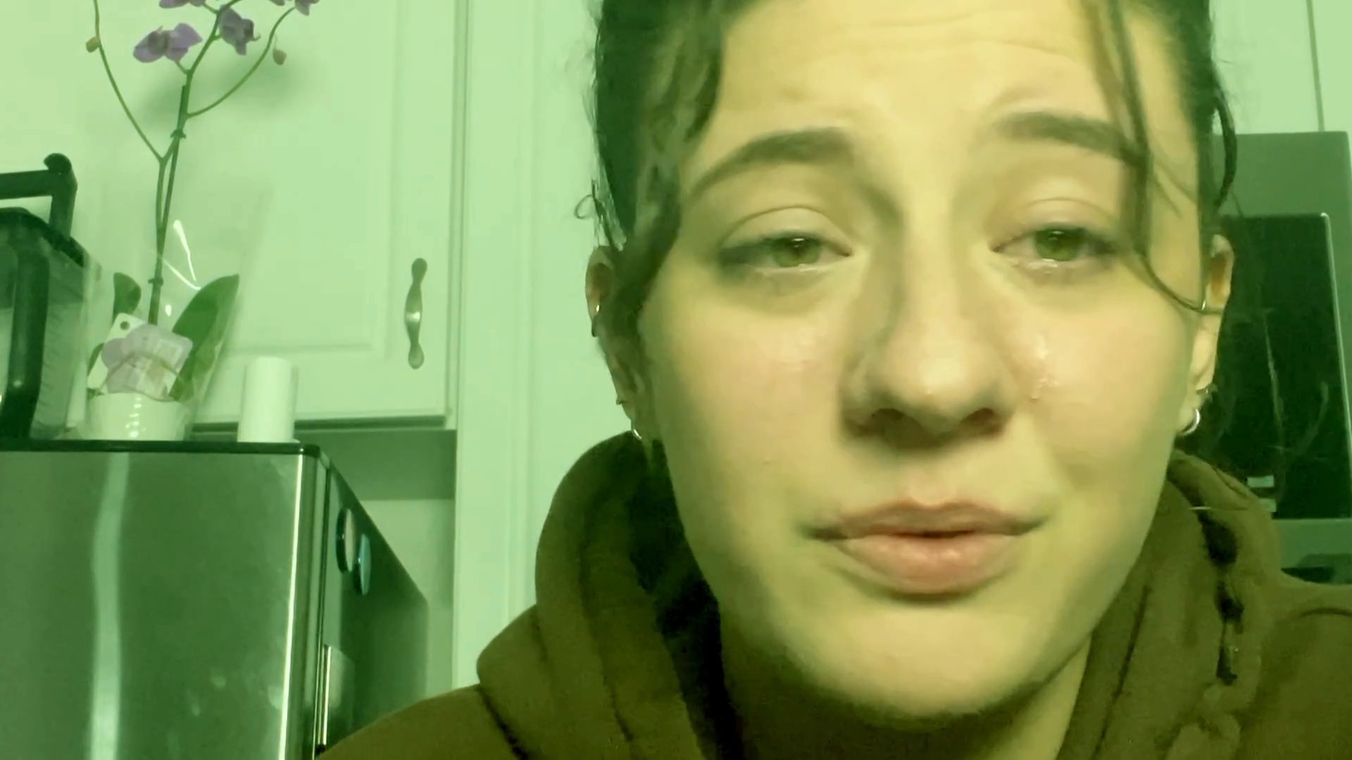 A woman exhibits visible distress and sheds tears while sharing a vulnerable personal experience on camera. The sequence captures her emotional state and shifting expressions during an intimate narrative.