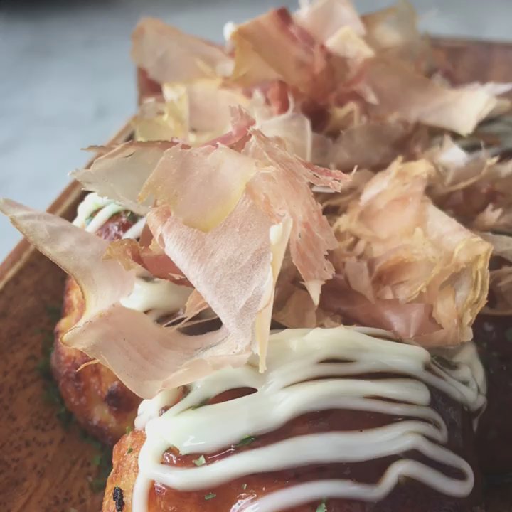Noren - wiggly bonito flakes on takoyaki - Japanese Near Me - Montreal, Quebec