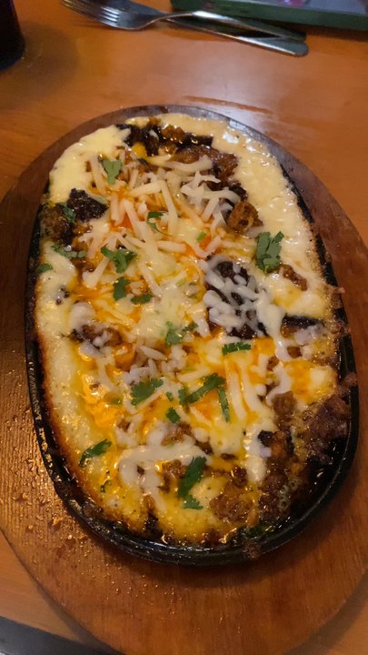 La Carreta - Bluebonnet - Queso Fundido served bubbling hot, it was delicious. - Mexican Near Me - Baton Rouge, Louisiana