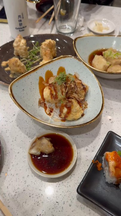 Mikuni - left to right:  - puff daddy - flaming shrooms - agedashi tofu - Japanese mafia roll - wonder roll (w/ lemon on top) - DMC roll - aburi 1 - Japanese Near Me - Concord, California