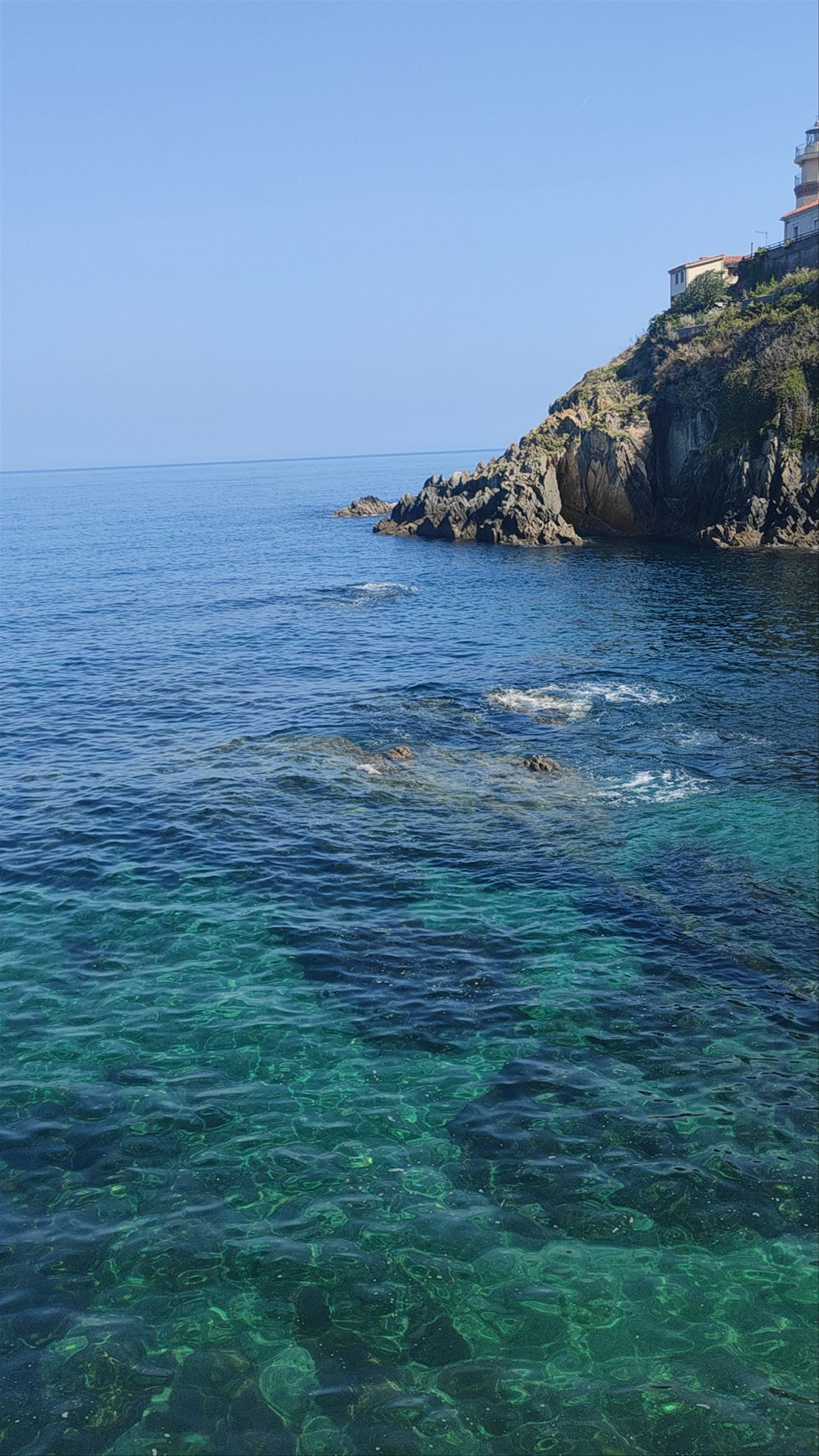 Playa de La Canal: Crystal Waters and Rugged Coastline in Llanes, Asturias