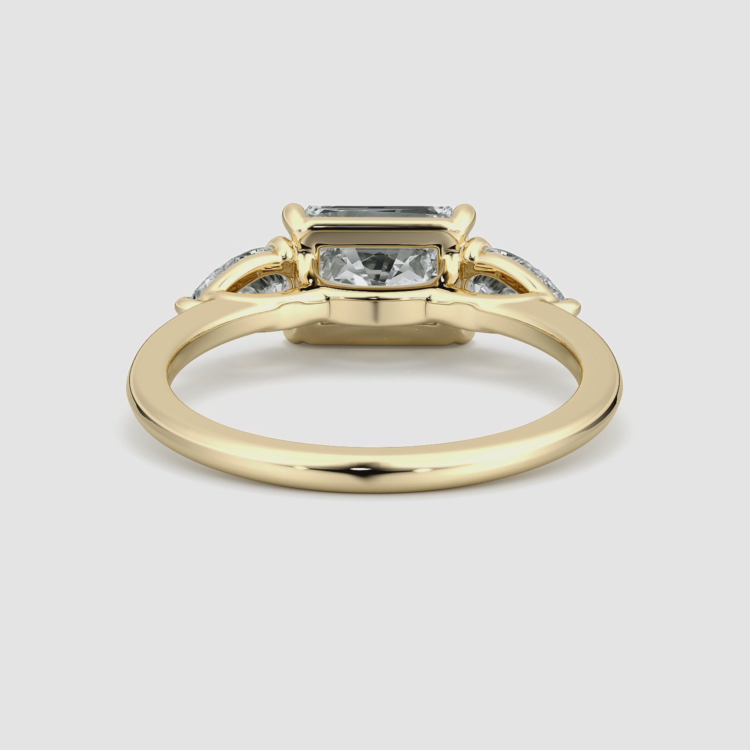 The Three Stone | Radiant | 18k | Yellow Gold | bandAccent: Plain | diamondOrientation: horizontal | sideStoneCarat: 0.25ct | sideStoneShape: Pear | caratWeight: other