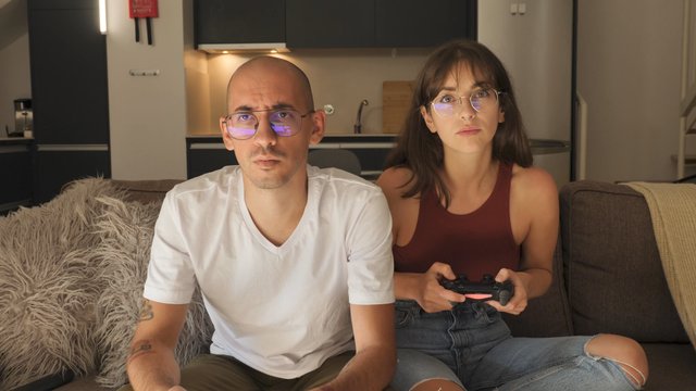A couple playing a video game