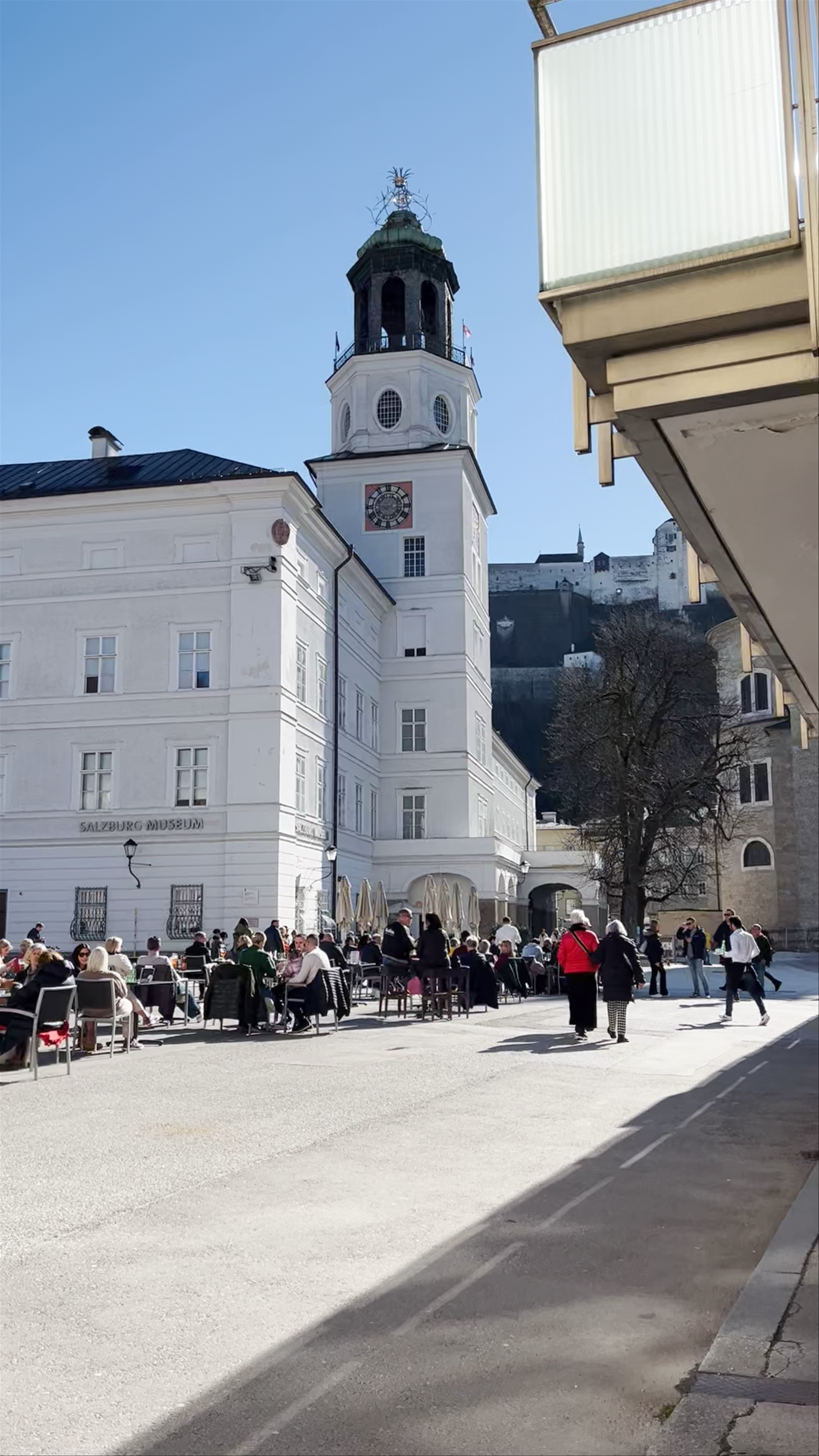 Sunlit Afternoon in Old Town Salzburg: Café Culture and Historic Charm