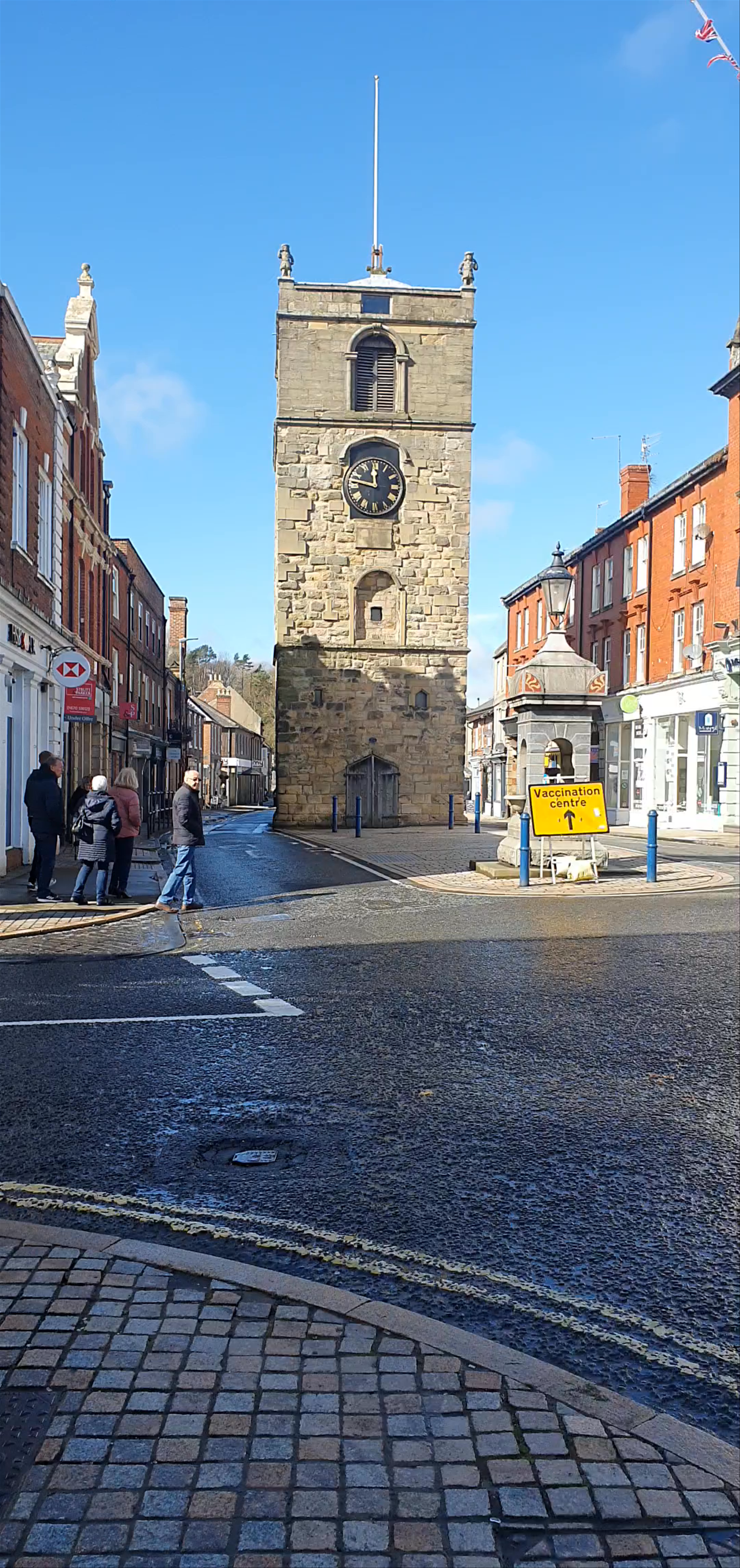 Historic Central Clock Tower in Morpeth under Clear Blue Skies
