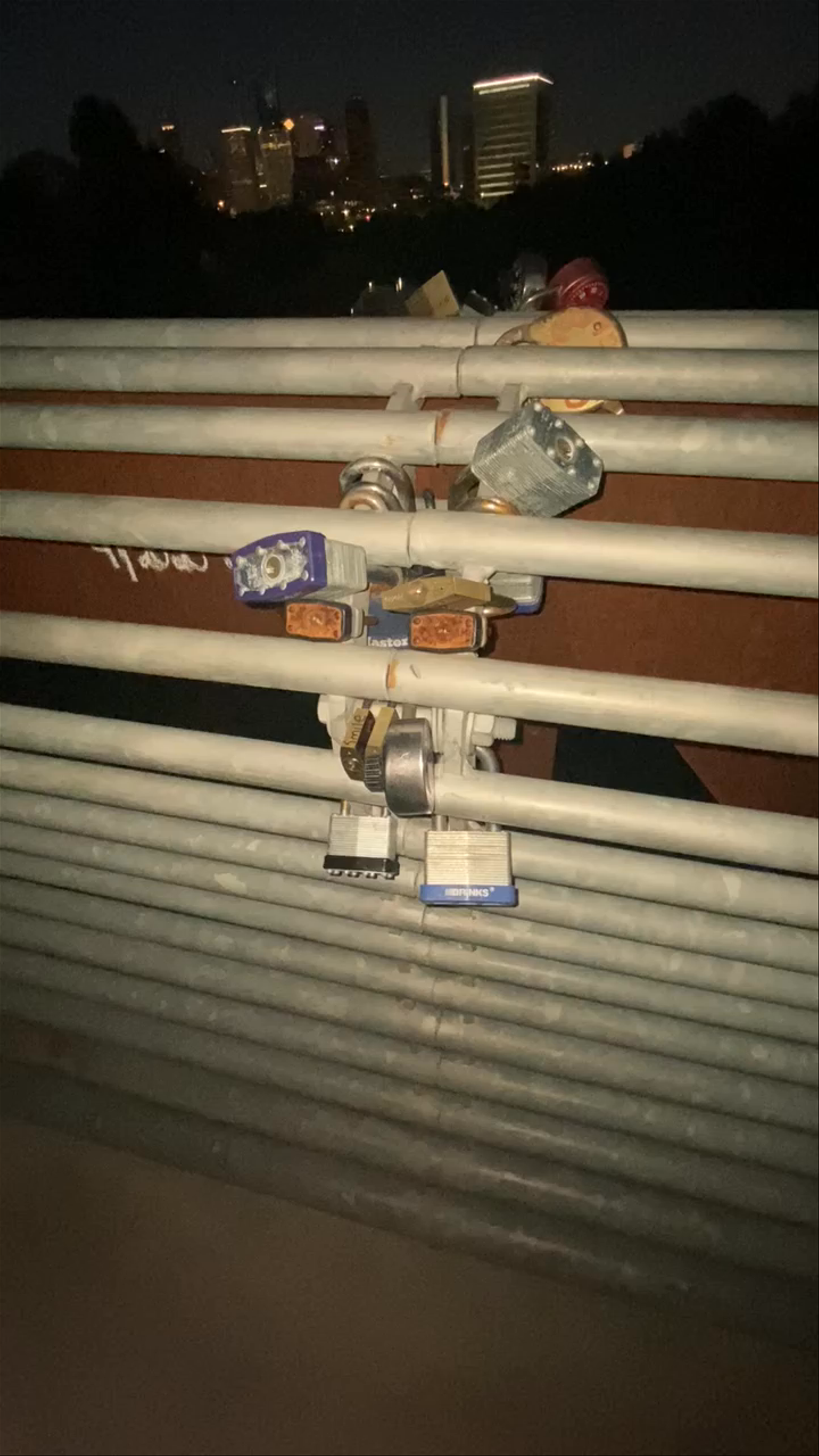 Nighttime Walk Along Buffalo Bayou Park's Love Locks Fence, Houston
