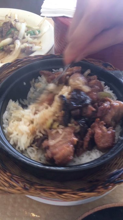 Le Lai - Mixing up the chicken and black mushroom clay pot. - Chinese Near Me - Houston, Texas