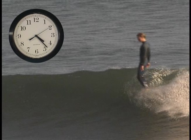 A surfer demonstrates athletic skill while riding a wave, accompanied by a visual timer measuring the duration of the maneuver. The sequence utilizes graphical transitions to emphasize the elapsed time of the surfing performance.