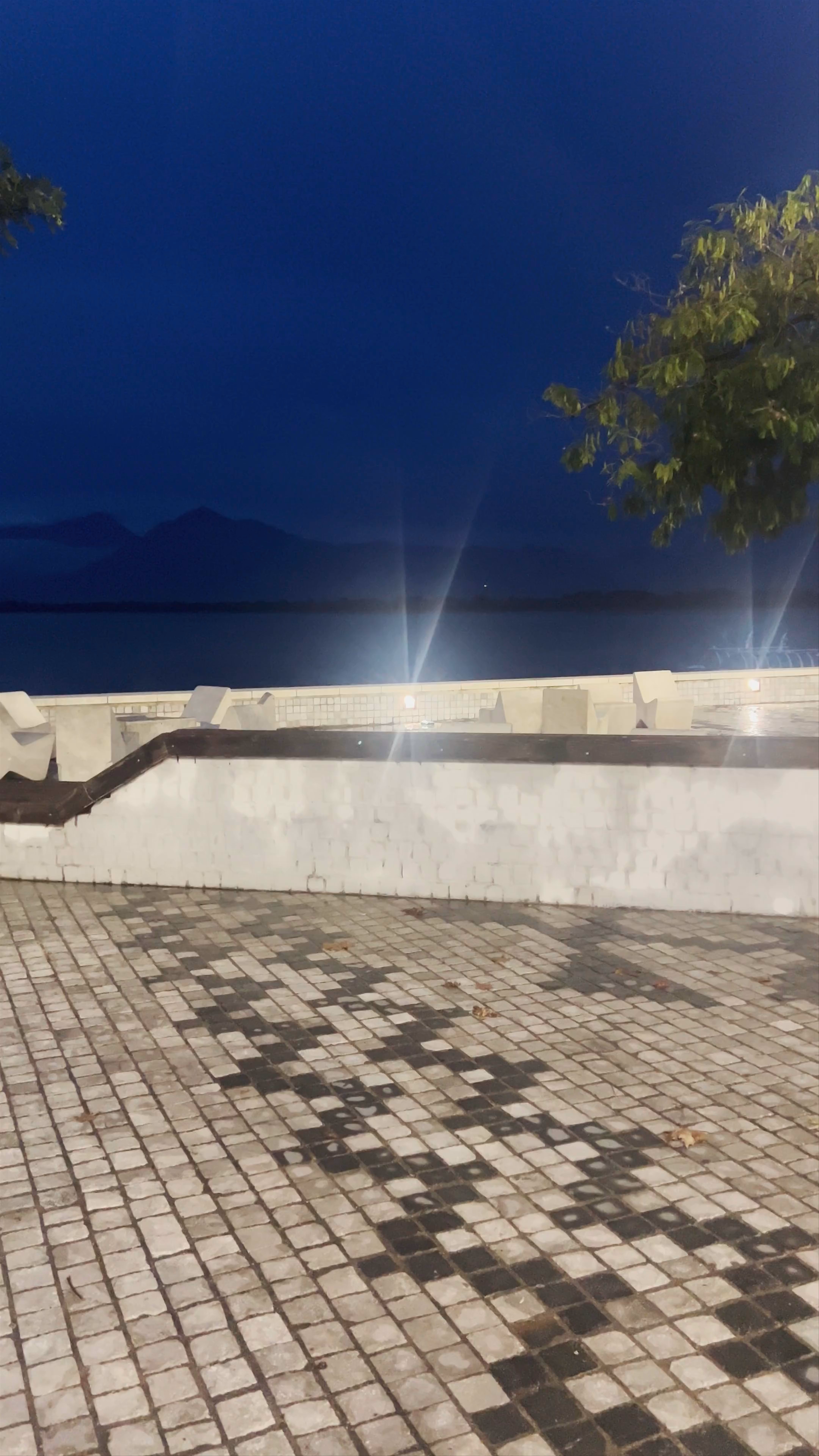 Shëtitorja Evening Stroll: Tranquil Waterfront Views in Shiroka, Albania