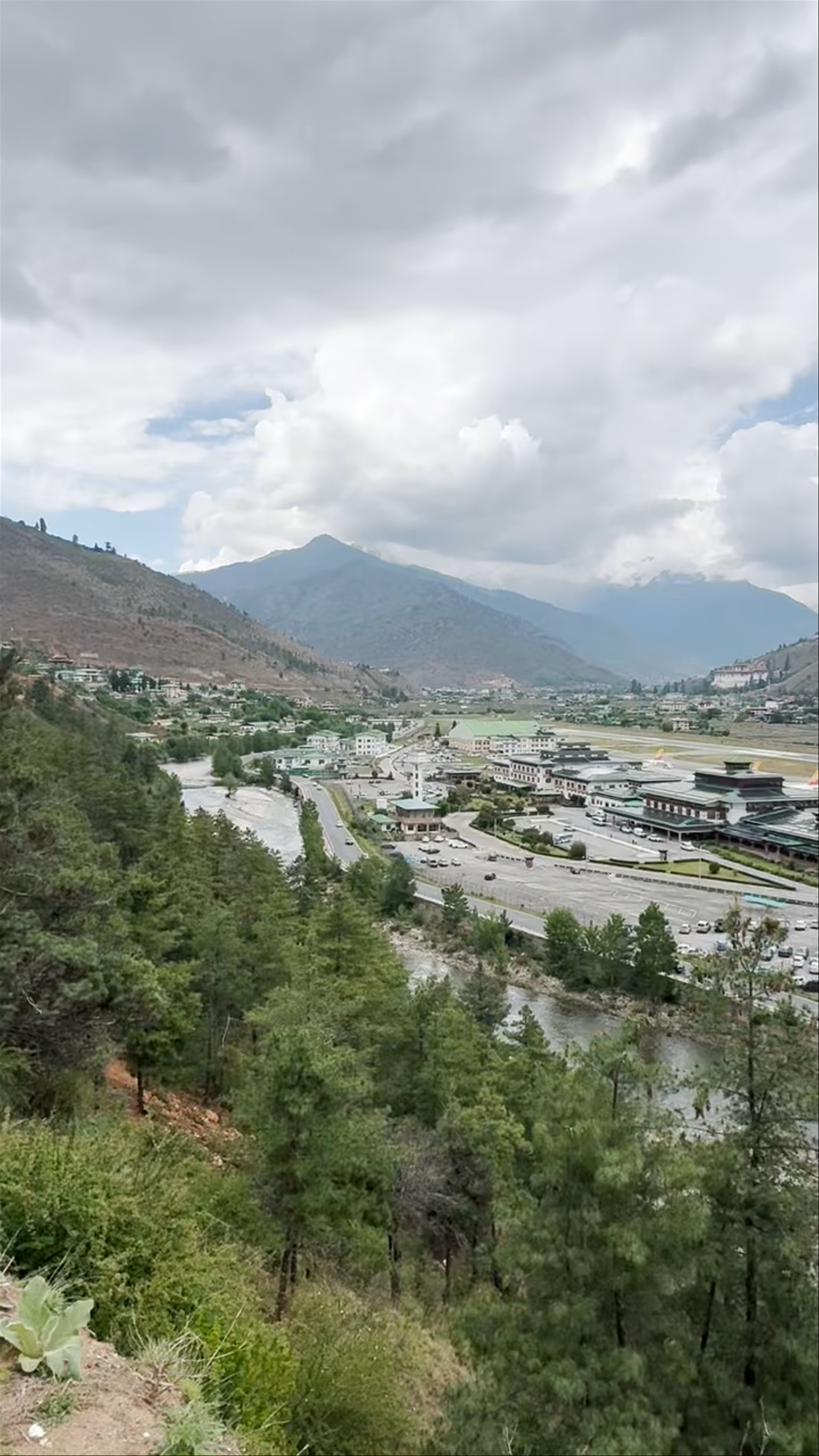 Bird's Eye View of Paro Airport Surrounded by Himalayan Mountains