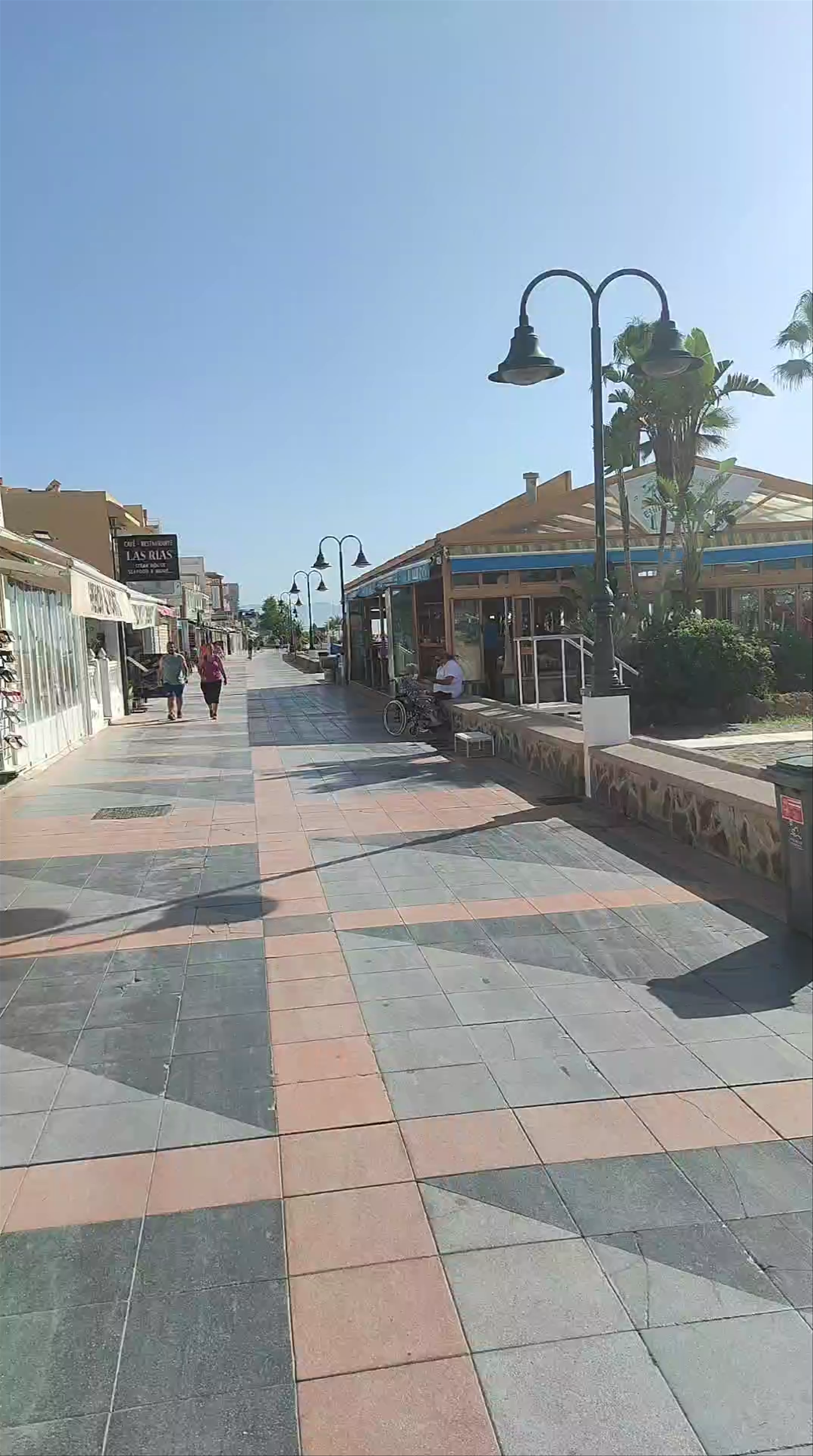 Beachfront Stroll Along Playa de la Carihuela in Torremolinos
