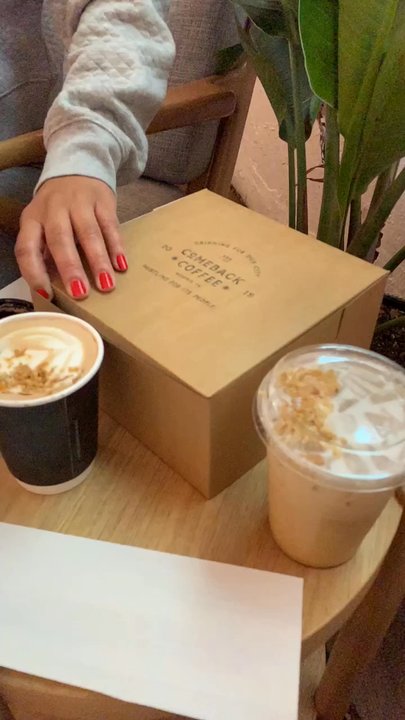Comeback Coffee - Me opening the box of pastries with a lot of enthusiasm and excitement - Coffee & Tea Near Me - Memphis, Tennessee