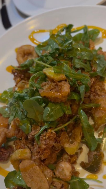 Mill's Tavern - full order of their local catch Calamari from Point Judith, RI, Calamari with julienne bell pepper and sweet and sour mango sauce $18 - Seafood Near Me - Providence, Rhode Island