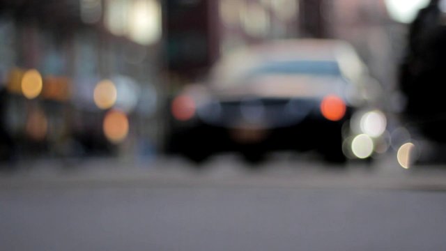 Close-up of cars driving