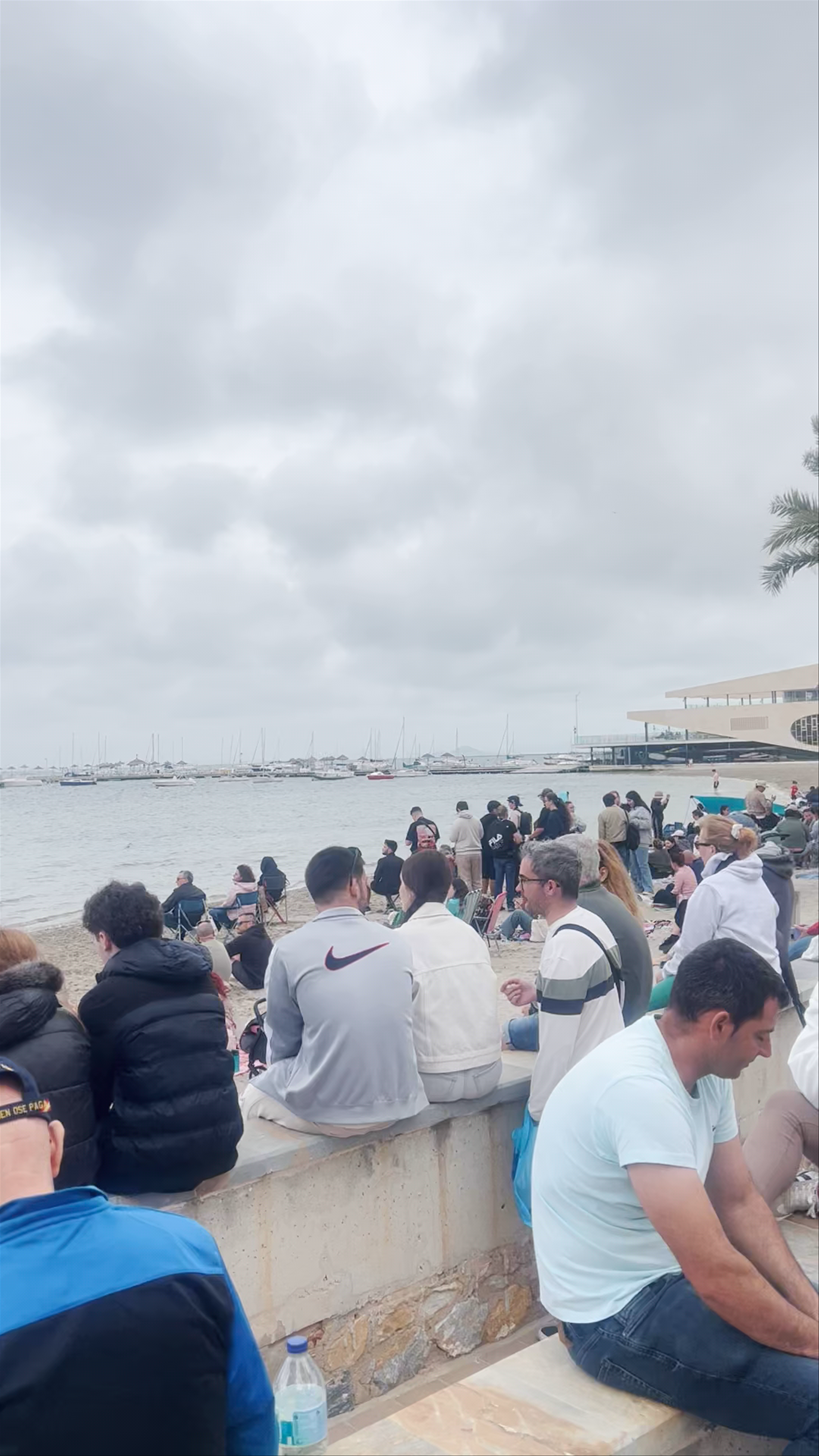 Beach Gathering and Marina Views at Playa del Pescador, Spain
