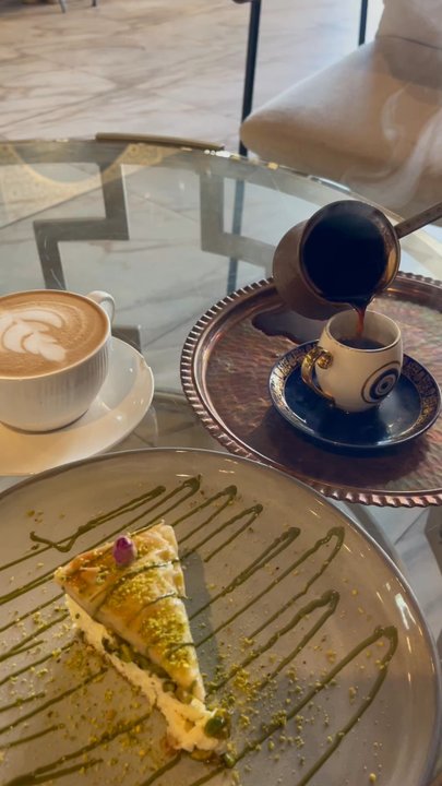 Peace Middle East Cafe - Turkish coffee (being poured), Arabic Latte, and Baklava Cheesecake - Desserts Near Me - Richardson, Texas