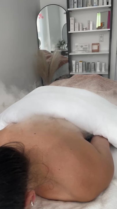 The Glow Studio - Steamer being used on my back to address acne. - Skin Care Near Me - Fullerton, California