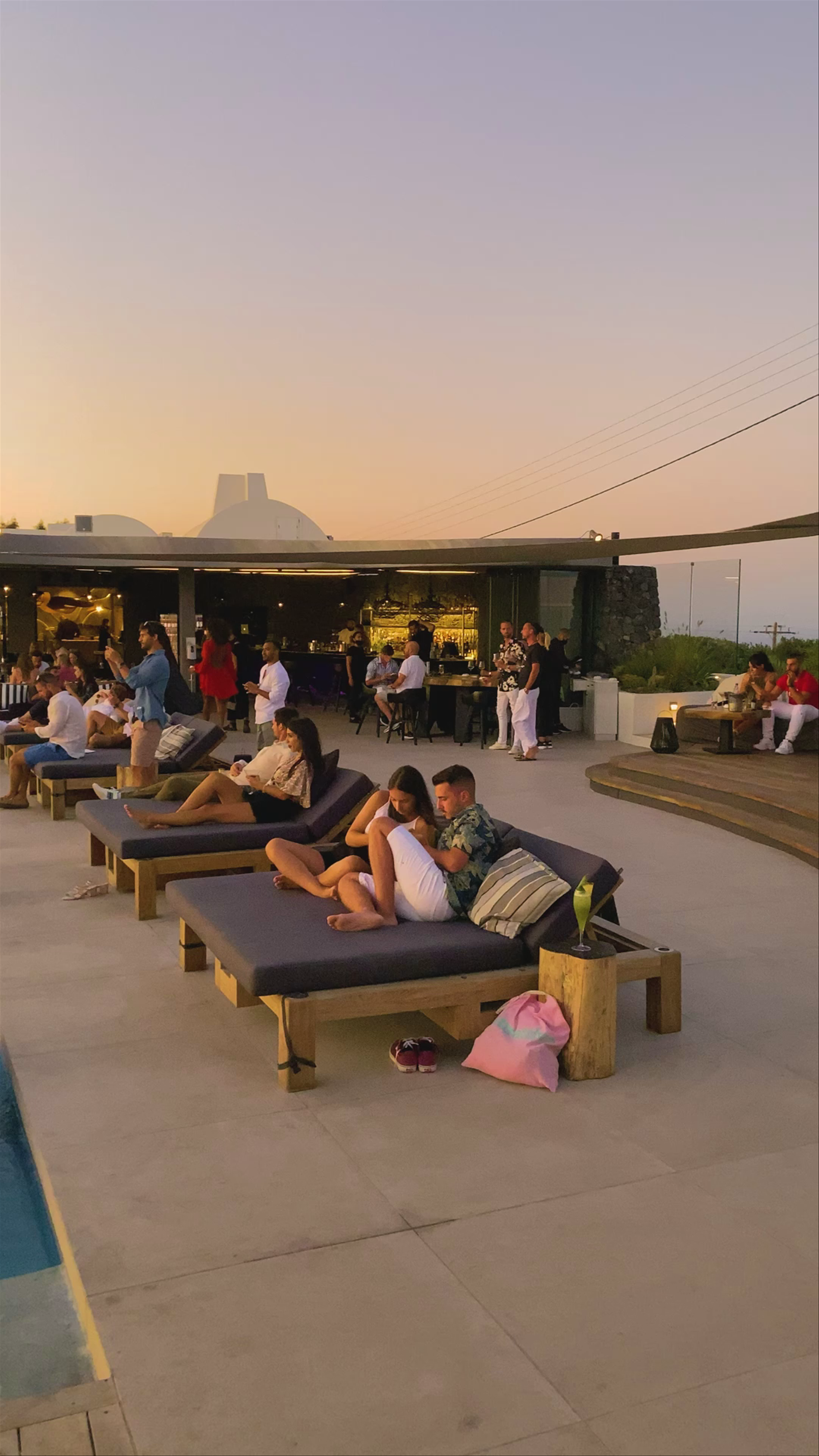 Sunset Bliss at Cavo Tagoo Santorini: Luxe Poolside Views in Imerovigli