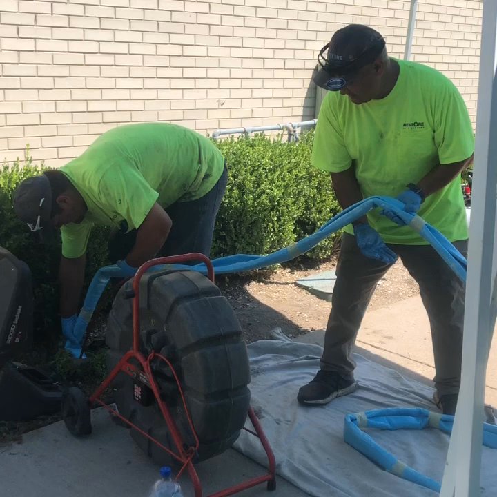 Restore Pipe Systems - Our guys installing a pull in place pipe liner under an apartment complex. - Plumbing Near Me - Logan, Utah