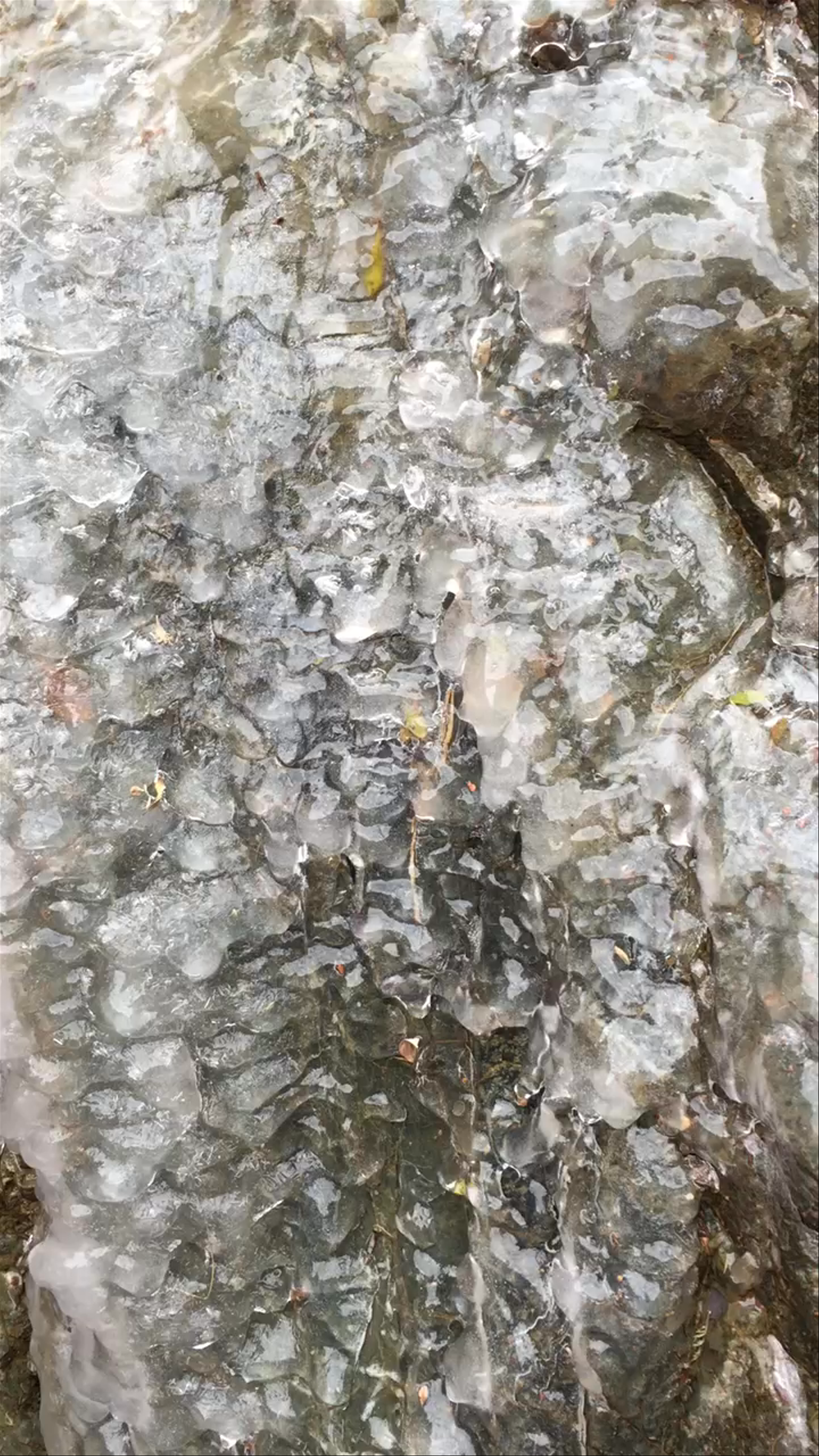 Semi-frozen waterfall in Konorchek Canyon
