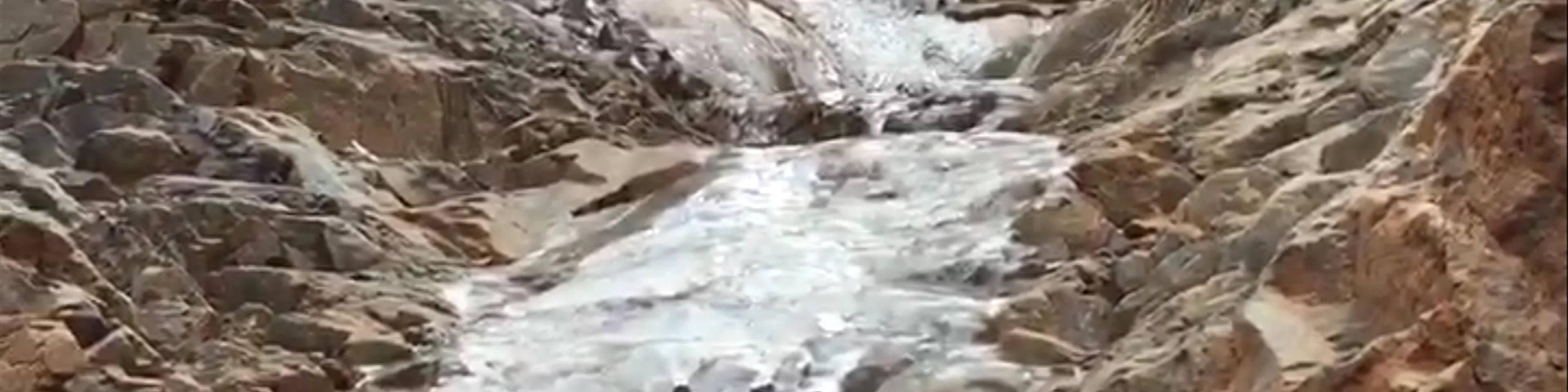 Semi-frozen waterfall in Konorchek Canyon