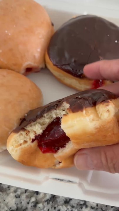 Daylight Donuts - Look at all that extra raspberry filling! - Donuts Near Me - Cartersville, Georgia