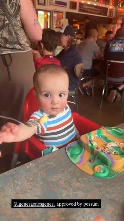 Gene's - little guy chomping on some ribs - Barbeque Near Me - Atlanta, Georgia
