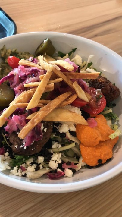 CAVA - Two bowls - you pick your toppings.  beef meatball & falafel - proteins  Fave sauce  - balsamic date vinaigrette.   1/2 lentils & 1/2 grains - Salad Near Me - St. Petersburg, Florida