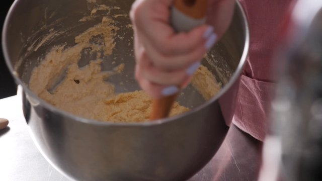 Mixing milk and dough together