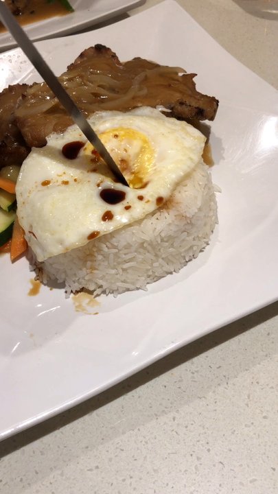 Matsuya - Pork chop, onion, gravy and egg on rice.  Video credit: Henry C. @ieat42 - Korean Near Me - Markham, Ontario