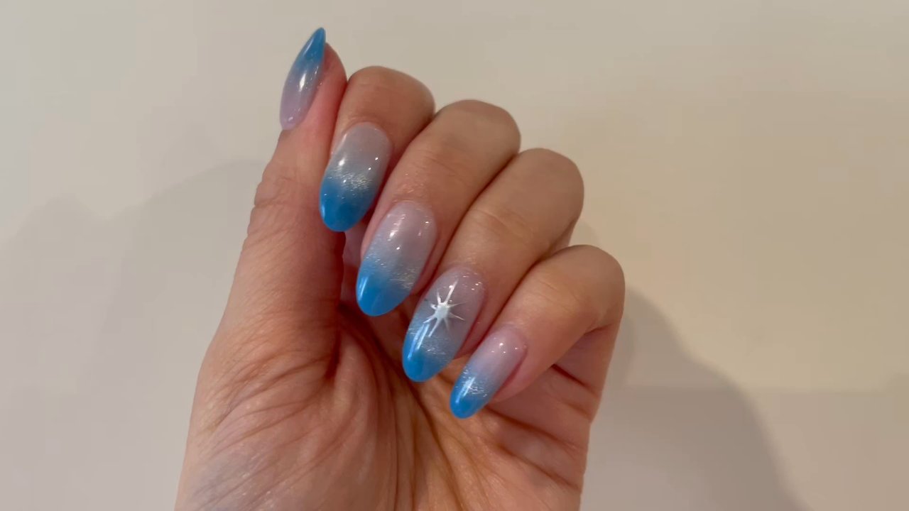 Bloom Nails & Spa - $85 acrylic dip full set with round tips. Blue ombré with silver cat-eye. Star design on ring finger. Technician/artist: Hannah. - Nail Salons Near Me - Kansas City, Missouri