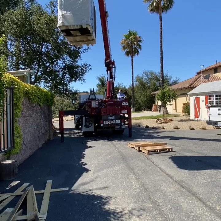 Sparkling Pools - Crane setting heat pump in place - Pool & Hot Tub Service Near Me - Panorama City, California