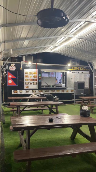 Oye Taquito - Outside dining space with picnic tables - Food Trucks Near Me - Austin, Texas