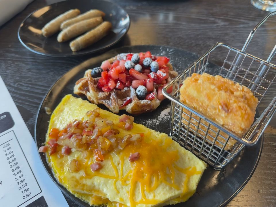 Honey Toast - Had the western omelette with the croffle topped with berries! Husband had the fish n chips. Both delicious! - Breakfast & Brunch Near Me - Fairborn, Ohio