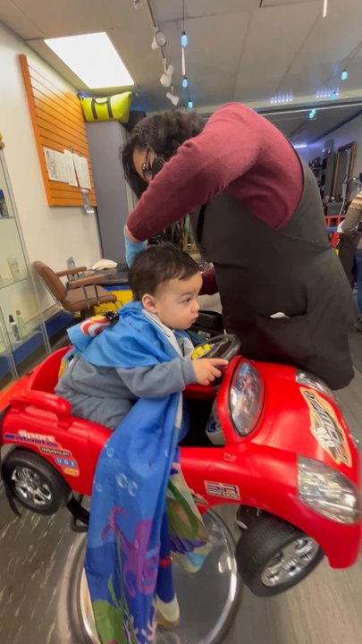 Kids Cuts - During. He loved the car and watching tv - Hair Salons Near Me - San Francisco, California