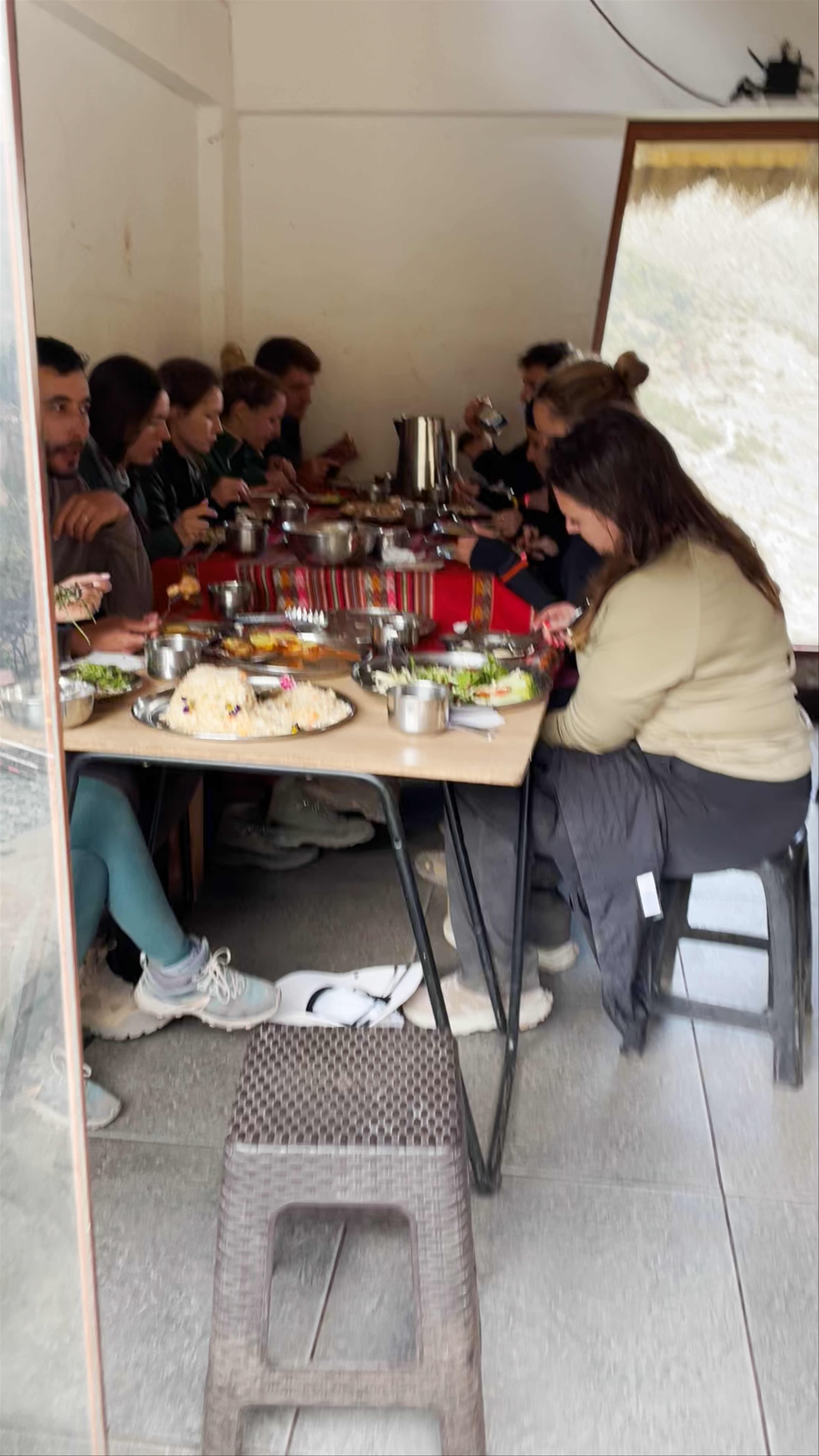 Shared Meal at Campamento Salkantaypampa during Salkantay Trek, Cusco, Peru