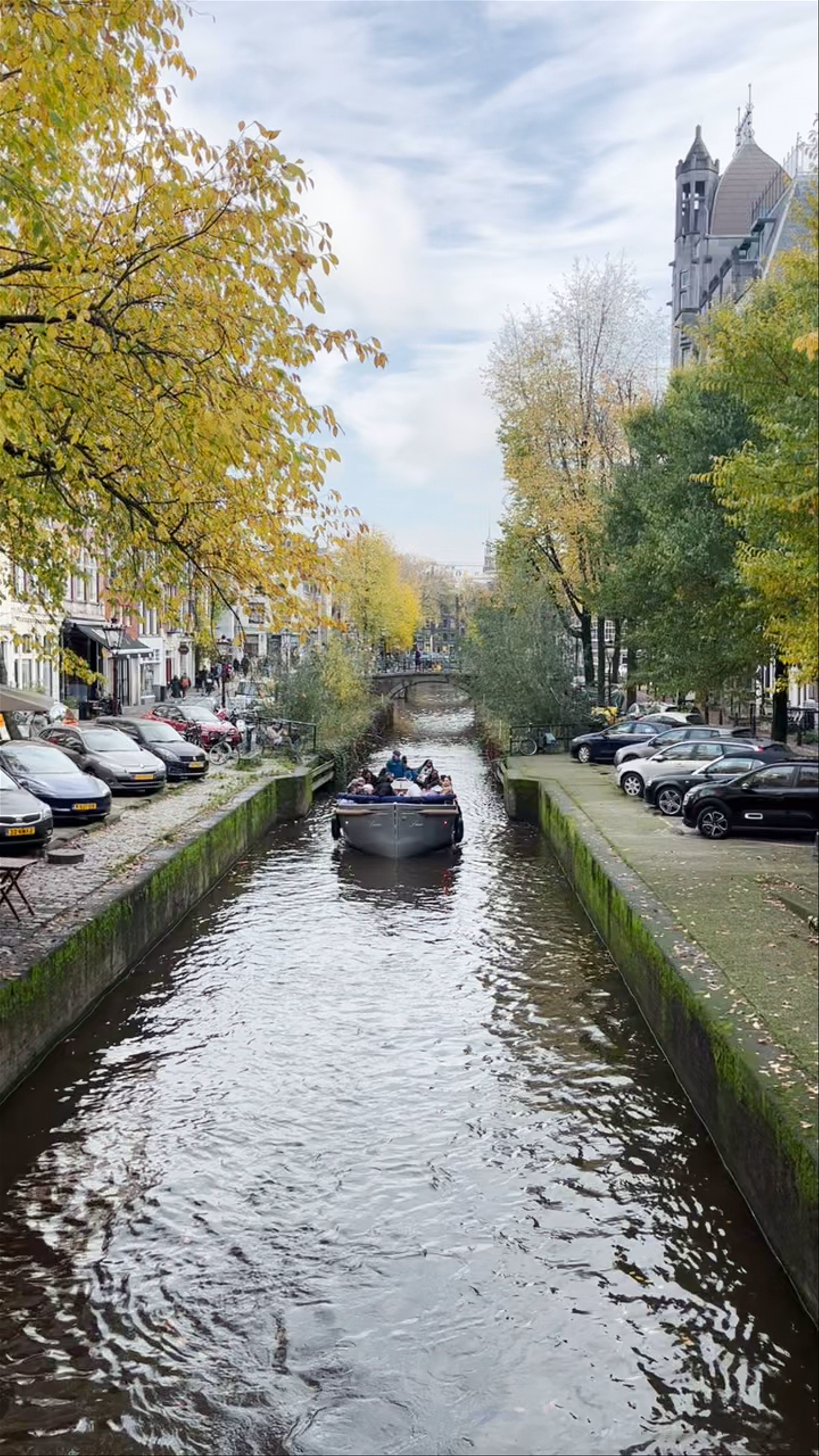 Canals of Amsterdam: A Serene Autumn Day Afloat
