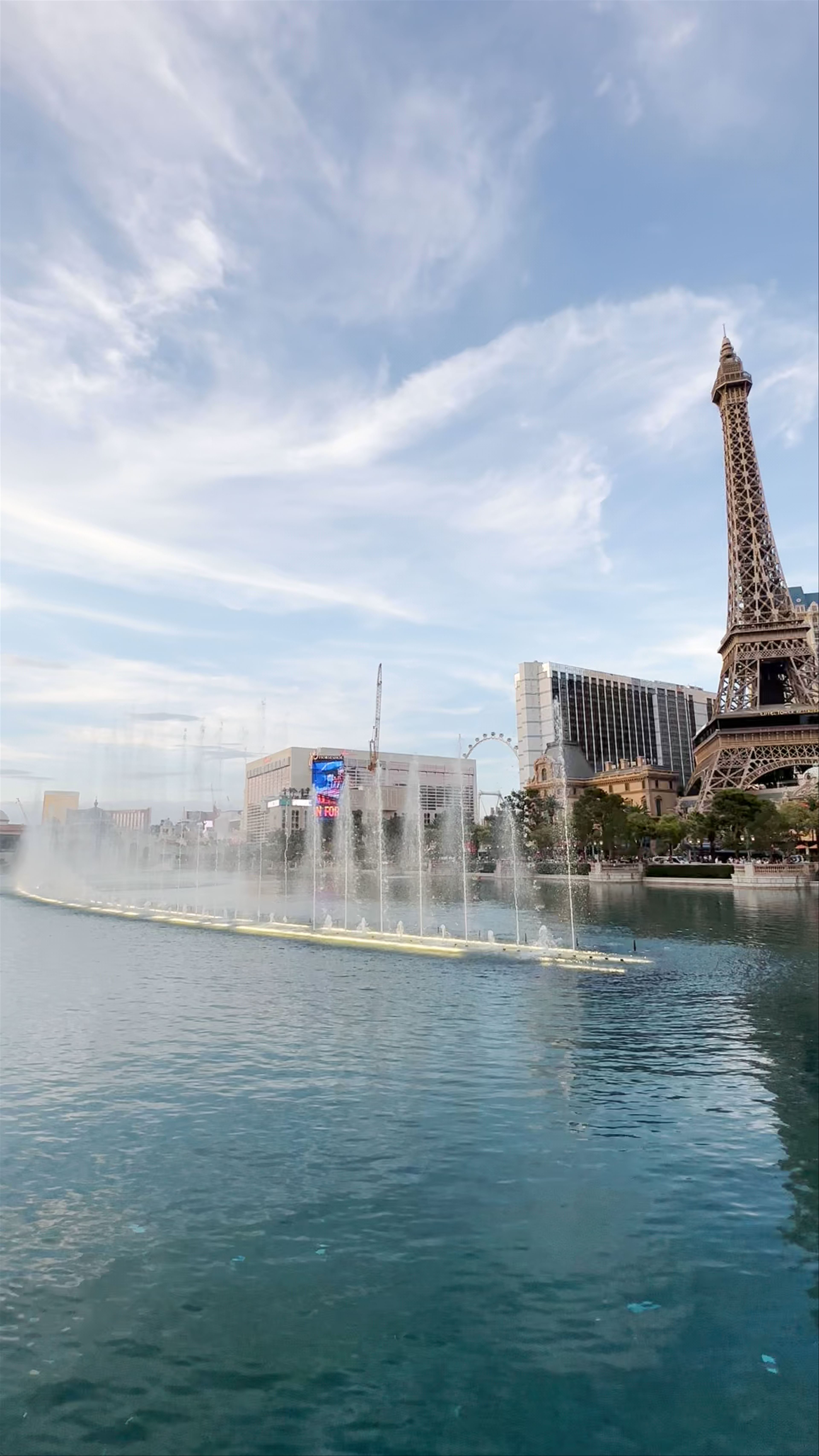 Las Vegas Fountains and Eiffel Tower Replica at Sunset
