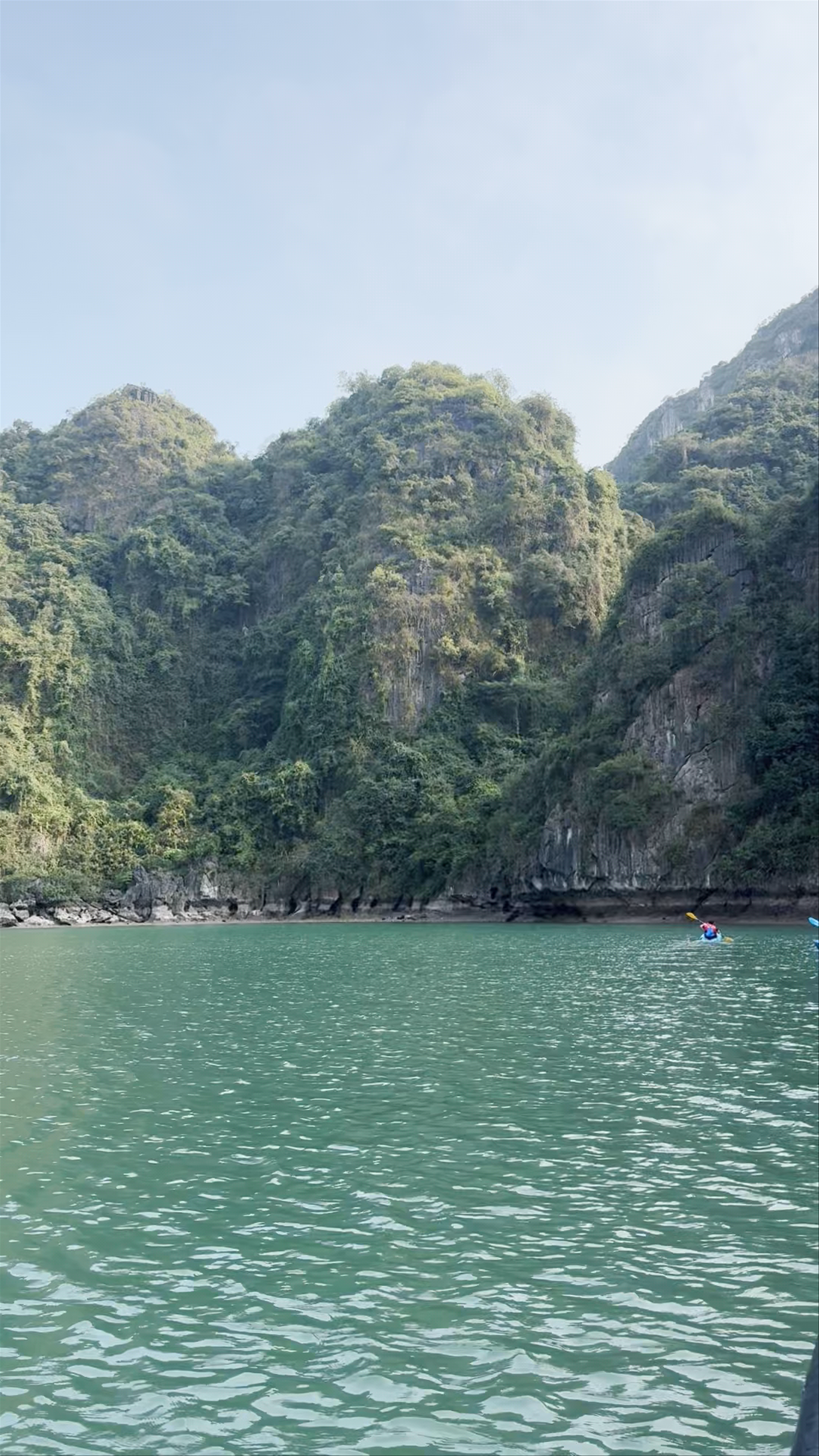 Halong Bay: Serene Kayaking Amid Limestone Karsts