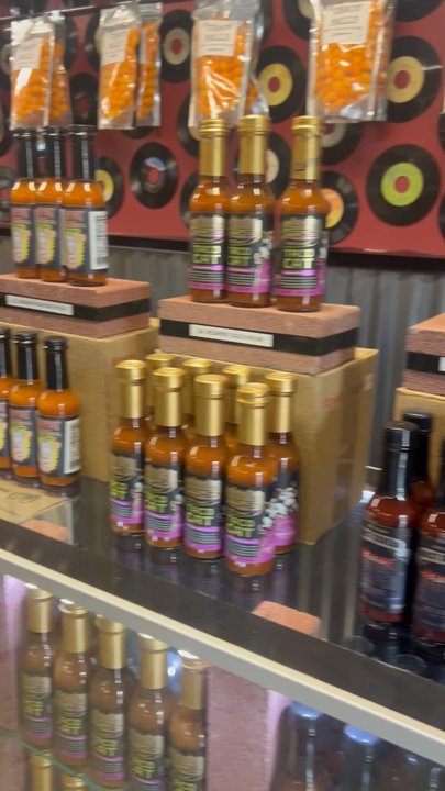 Greenport Fire - Scanning the variety of sauces on display - Tobacco Shops Near Me - Greenport, New York