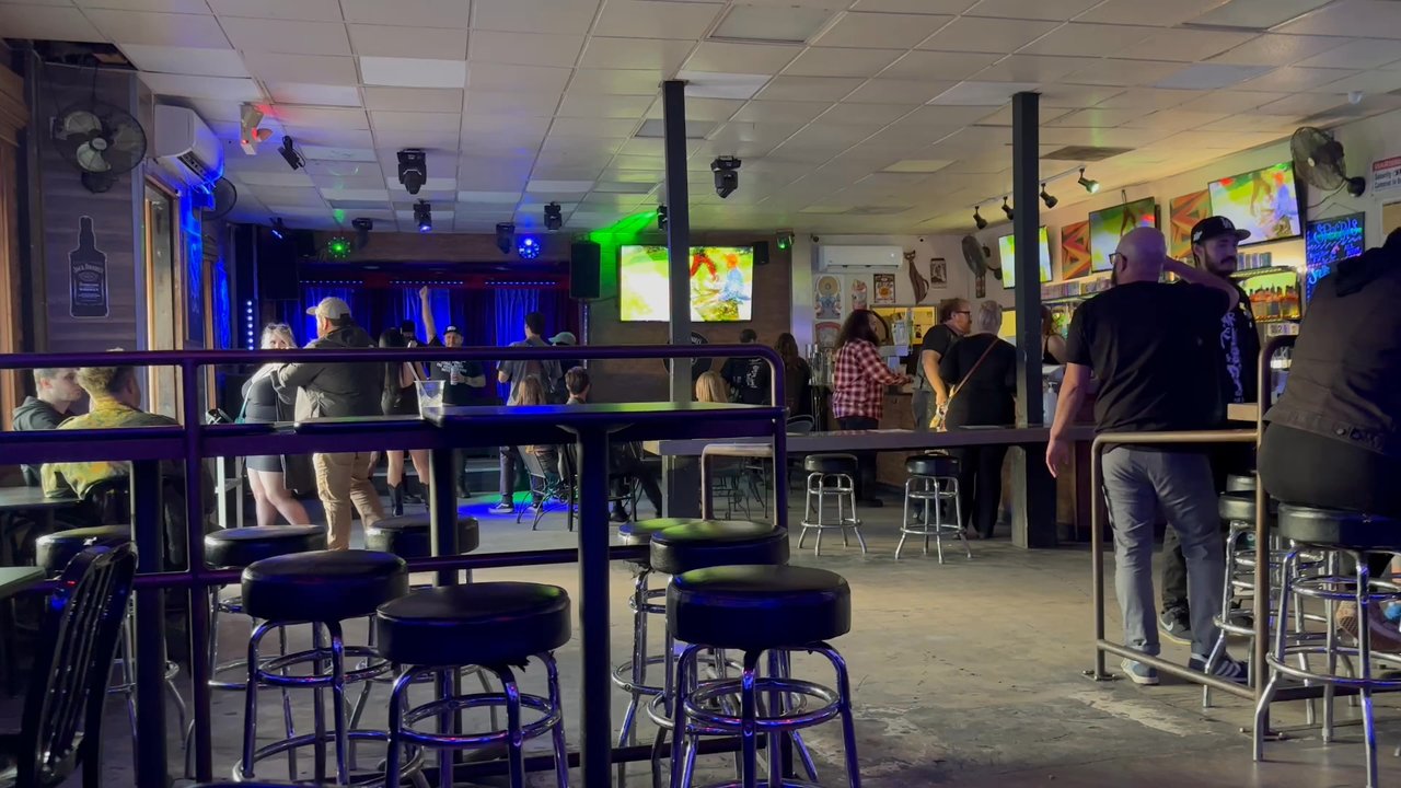 Pixels Bar And Eatery - The bar setting from the booths against the wall - Bars Near Me - Riverside, California