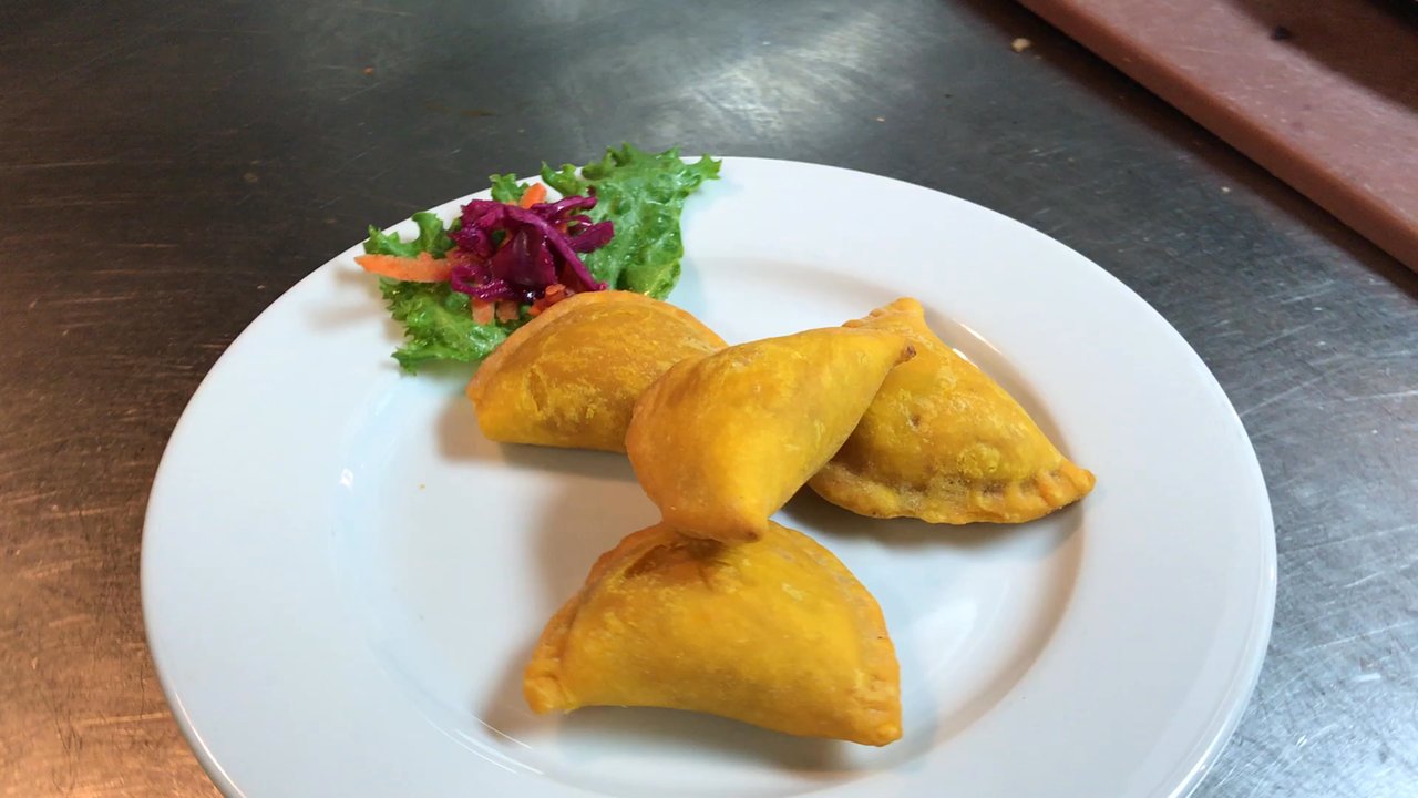 Footprints Cafe - Beef patties - Bars Near Me - Brooklyn, New York