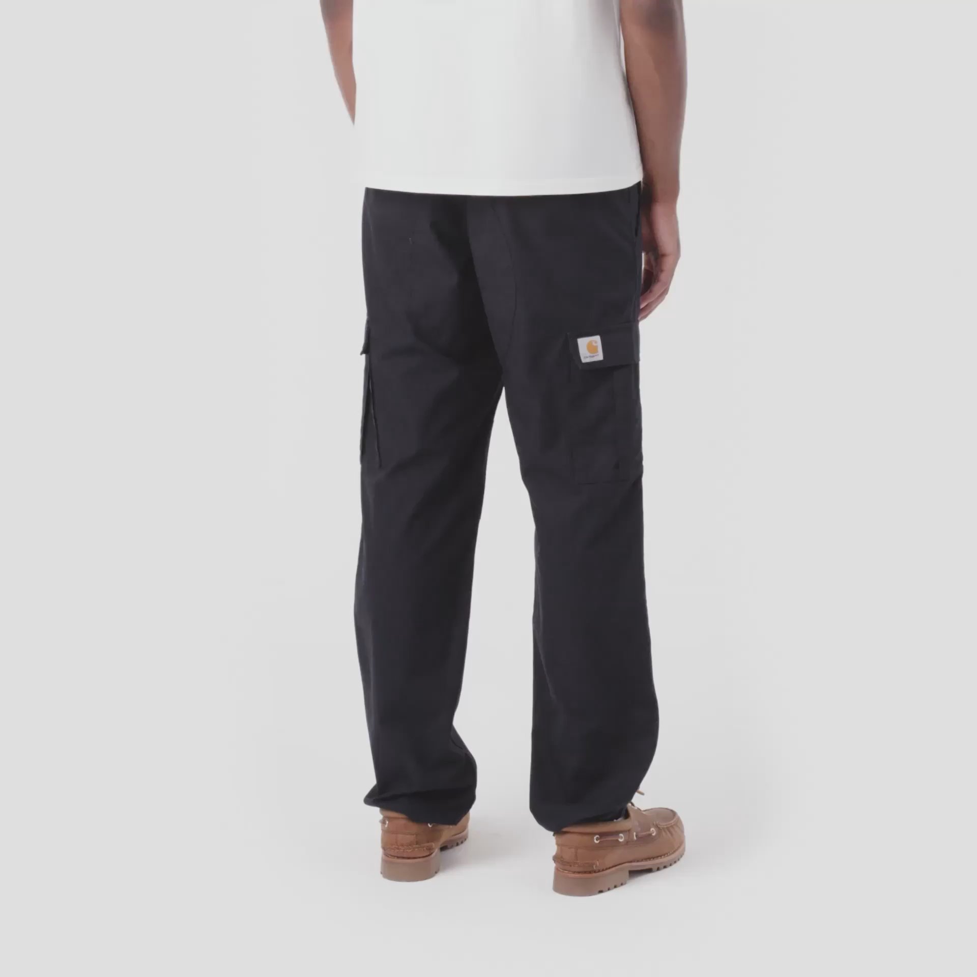 Model wearing a pair of Aviation Pants in Dark Navy