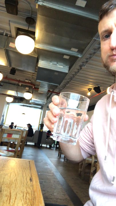 Bareburger - Plainview - Me and my son sitting in the restaurant waiting for our burger, salad, fries and strawberry vanilla milkshake!! - New American Near Me - Plainview, New York