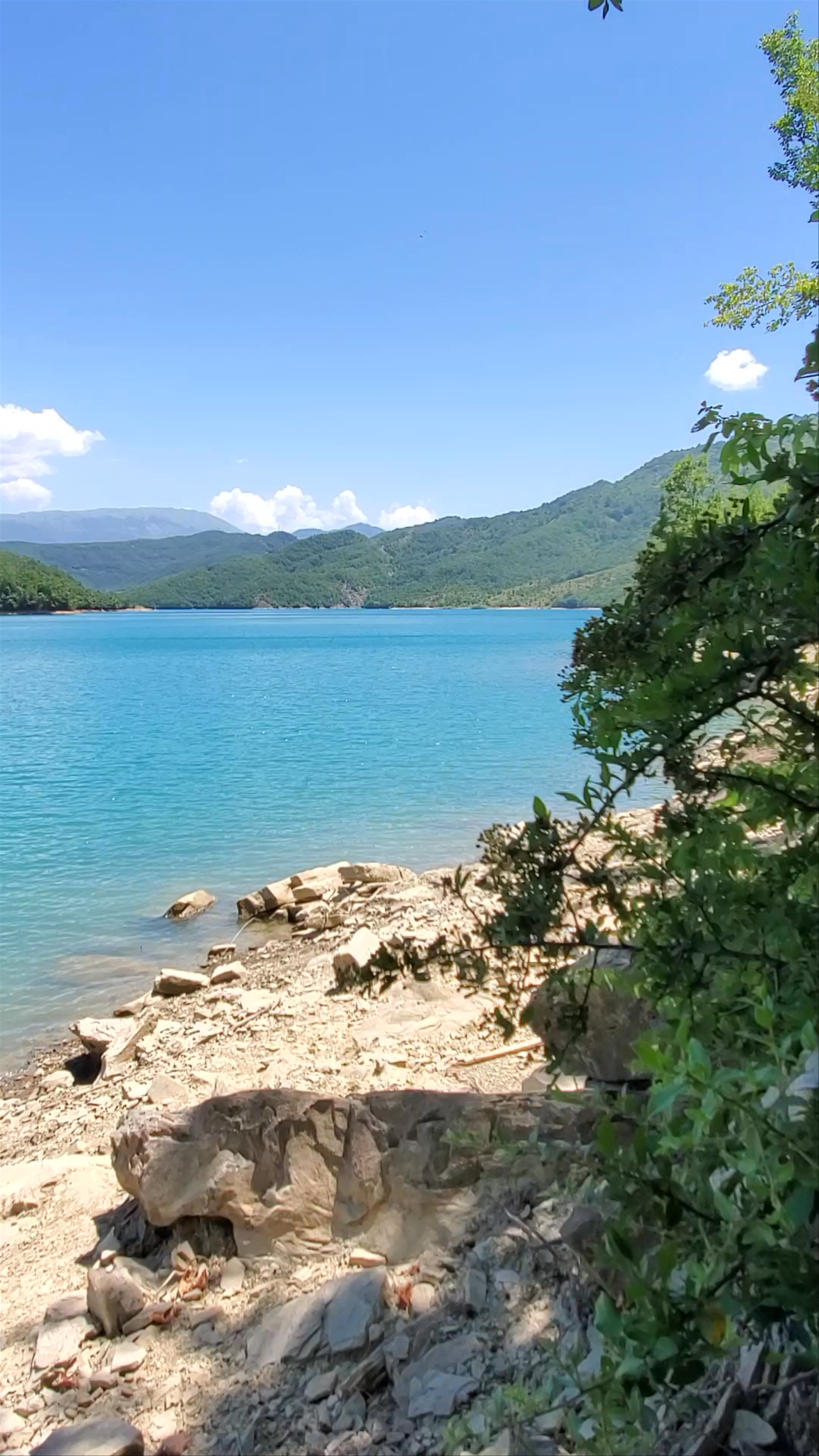 Serene Waters and Majestic Hills at Lake Bovilla, Albania